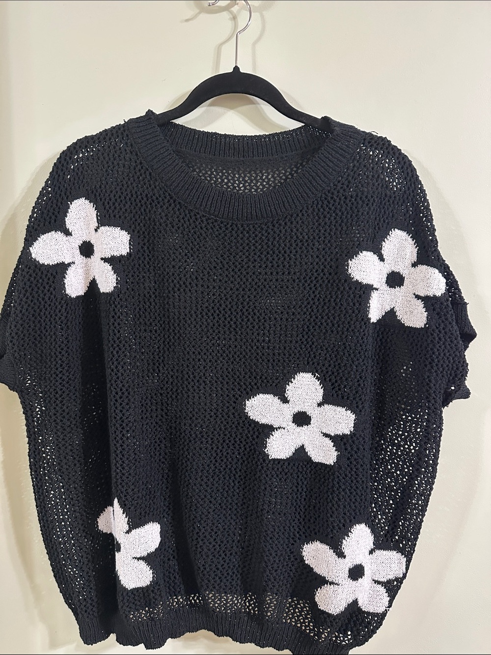 Black Open-Knit Sweater with White Daisy Appliqués